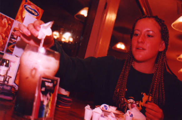 lara at denny's before the party, making a rootbeer and half an half drink